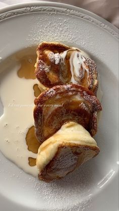 some kind of pastry on a white plate