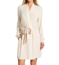 Long-sleeved robe is pleasantly soft for restful sleep and lounge. The floral lace details at cuffs and belt casing add an elegant touch. Made of knit micro modal, nylon, and elastane. Robe has a standing back neckline. Long sleeves help keep you warm. Removable satin belt secures at front. Sleeve cuffs and belt casing have floral lace overlay with rose gold metallic embroidery. On-seam pockets hold a phone. Satin internal ties also secure the front. Turned and stitched hem. Micro modal knit is V-neck Lace Trim Robe For Daywear, Long Sleeve Sleepwear With Lace Trim For Loungewear, Soft Long Sleeve Sleepwear For Relaxation, Relaxed Fit Long Sleeve Lounging Robe, Long Sleeve Robe With Tie Waist For Lounging, Tie Waist Wrap Sleepwear, Tie Waist Wrap Sleepwear For Loungewear, Wrap Sleepwear With Tie Waist For Loungewear, Feminine Long Sleeve Sleepwear For Loungewear