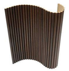 a close up view of an accordion made out of wood strips on a white background