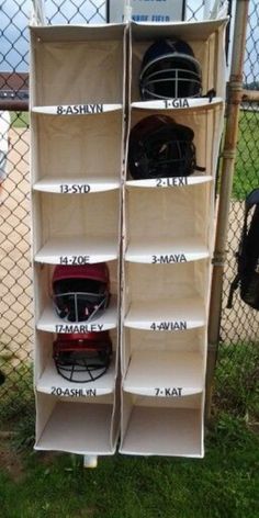 the baseball equipment is on display in the fenced area