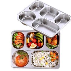 a metal tray filled with different types of food