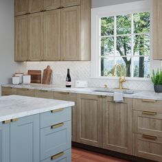 a kitchen with wooden cabinets and white marble counter tops, along with a window over the sink