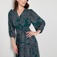 Made from a soft woven blend, this Ryegrass women's floral-print midi dress is perfect for the office or a gathering. It has a wrap v-neckline, 3/4 raglan sleeves, a waist tie and a pleated skirt. Wear it with flat or wedge sandals.Features: Tie-WaistClosure Type: ElasticNeckline: V NeckSleeve Length: 3/4 SleeveSleeve Style: Raglan SleeveApparel Length: 50 Inches - FrontDress Length: Midi LengthFiber Content: 100% PolyesterFabric Description: WovenLining Material: PolyesterCare: Machine WashCou… Elegant Printed Mid-length Midi Dress, Elegant Printed Midi Dress, Elegant Printed Green Midi Dress, Chic Midi Dress With Floral Print And 3/4 Sleeves, Elegant Green Printed Midi Dress, Floral Print 3/4 Sleeve Midi Dress For Fall, Floral Print Midi Dress With 3/4 Sleeves For Fall, Spring Printed Maxi Dress For Workwear, Floral Print Fall Midi Dress With 3/4 Sleeves