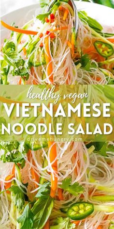 a white plate topped with noodles and veggies next to a green leafy salad