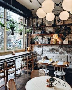 the instagram page on instagram shows an image of a restaurant with tables and chairs