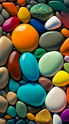 many different colored rocks are arranged together