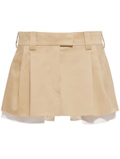 embroidered-logo chino miniskirt from MIU MIU featuring beige, cotton, pleat detailing, embroidered logo to the rear, low-rise, button fly fastening, belt loops, two rear welt pockets and layered details. | Miu Miu Embroidered-Logo Chino Miniskirt Skirt Png, Beige Skirt, Exclusive Fashion, Skirt Design, Pleated Mini Skirt, Jacket Tops, Valentino Garavani, Fall Fashion, Miu Miu