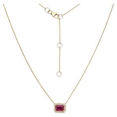 The Emerald Cut Ruby & Diamond Halo Necklace (1.41 ct.) in 14K Gold is a stunning piece of jewelry that features a beautiful emerald cut ruby surrounded by a halo of sparkling diamonds. This necklace is made of 14K gold, which is a durable and long-lasting metal that complements the deep red hue of the ruby and the brilliance of the diamonds. The pendant hangs from a delicate chain, which adds a touch of elegance to the necklace. The emerald cut ruby is a classic and timeless gemstone that symbo Halo Necklace, Halo Setting, Delicate Chain, Ruby Diamond, Diamond Halo, Sparkle Diamonds, Halo Diamond, Deep Red, Emerald Cut