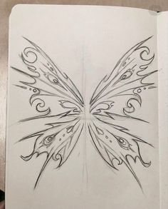 a drawing of a butterfly with swirls on it's wings