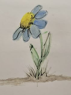 a drawing of a blue flower on a white paper with green stems and yellow center