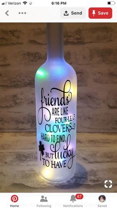 a bottle that has some kind of message on the inside of it, and is lit up