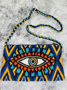 Handmade bags, made in Colombia Blue Artisan Crochet Rectangular Bag, Blue Artisan Rectangular Crochet Bag, Artisan Blue Rectangular Crochet Bag, Blue Rectangular Artisan Crochet Bag, Handmade Multicolor Satchel For Shopping, Handmade Pouch Shoulder Bag As Fashion Accessory, Yellow Artisan Bag For Everyday Use, Artisan Yellow Bag For Everyday Use, Handmade Pouch Shoulder Bag For Fashion