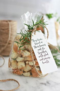 a bag filled with small pieces of food next to twine