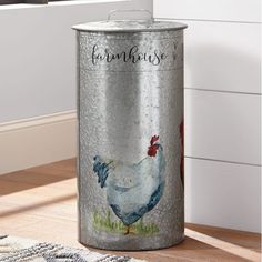 a metal can with a chicken painted on it