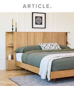 a bed sitting on top of a hard wood floor