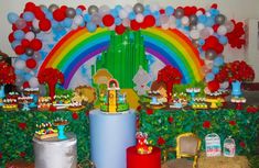 a birthday party set up with balloons and decorations