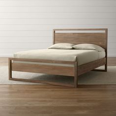 the bed is made and ready for someone to use it in their home or office