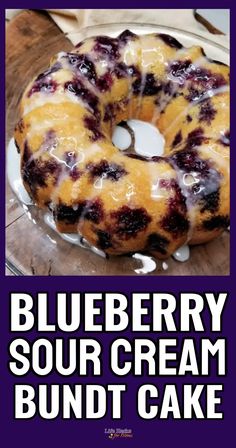 a blueberry sour cream bundt cake on a plate with the words, blueberry sour cream bundt cake