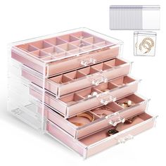 the drawers are filled with different types of jewelry