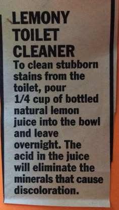 a sign on the wall that says lemony toilet cleaner to clean stubborn stains from the toilet, pour 1 / 4 cup of bottled juice into the bowl and leave