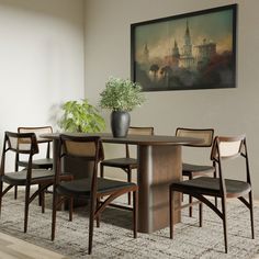 a dining room table with chairs and a potted plant on top of the table