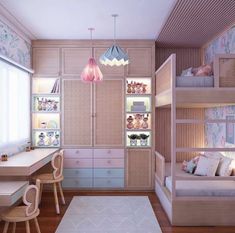 a bedroom with bunk beds and desks in it