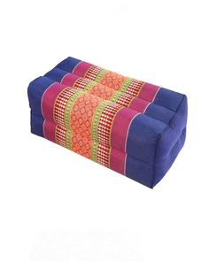 a multicolored bench cushion on a white background