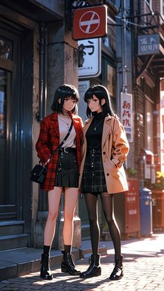 two young women standing next to each other on a sidewalk