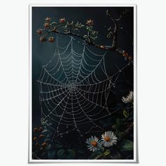 a spider's web on a tree branch with daisies