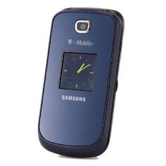 a blue samsung cell phone with a clock on the front and back cover that says t - mobile