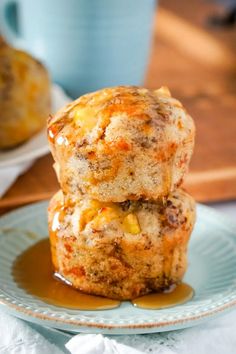 two muffins sitting on top of a blue plate