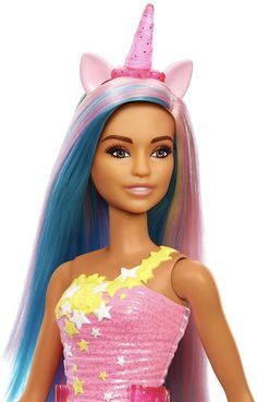 the doll is wearing a pink dress with blue hair and a unicorn horn on her head