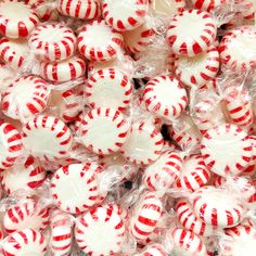 many red and white candies are wrapped in plastic