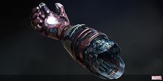 an iron man glove is shown with its light shining on it's left hand