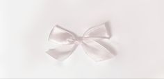 a white bow on a white background