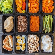 an assortment of vegetables and meats in plastic containers