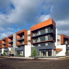 an apartment building with many balconies and windows