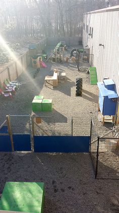 an outdoor play area with toys and equipment