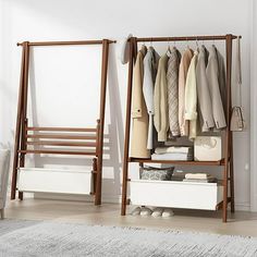 an open closet with clothes and shoes hanging on the rack, next to a white chair