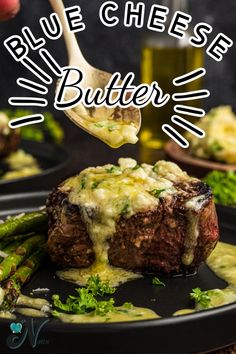 blue cheese butter sauce being drizzled over a steak on a black plate with asparagus