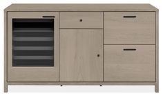 the sideboard is made from wood and has two drawers, one with glass doors