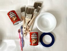 the supplies needed to make an art project include paint, toothbrushes and baking powder