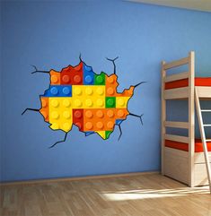 a child's room with a lego wall decal and bunk bed in the corner