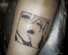 a person with a tattoo on their arm that has an image of a woman's face