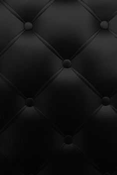 black leather texture background with buttons and rivets