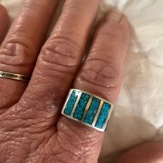 From Estate::: Sterling Silver And Inlaid Turquoise Hammered Ring Unisex Size 11. Very Heavy Large Ring. 4 Strips Of Inlaid Turquoise Across The Top, Hammered All Around Sides And Bottom. Marking Inside Band Can Only Be Seen With A Loop, I Cannot Capture The Marking! Estate Estimate $700 Circa 1970’s Hammered Rings, Large Ring, Womens Jewelry Rings, Blue And Silver, Turquoise Ring, Women Jewelry, Turquoise, Sterling Silver, Silver