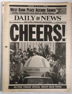 the front page of news paper with an image of baseball players and fans on it