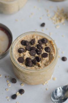 an oatmeal in a jar with chocolate chips on top