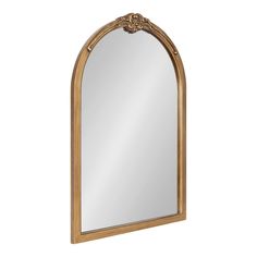 a gold framed mirror with an ornate arch on the top and bottom edge, against a white background