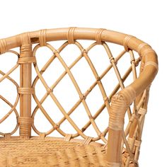 a wicker chair with woven seat padding on the back and armrests